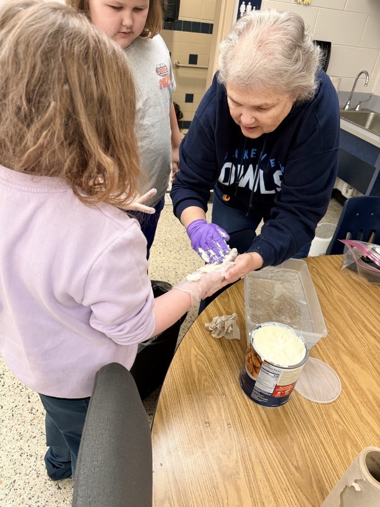 Teacher with Student - Science Experiment