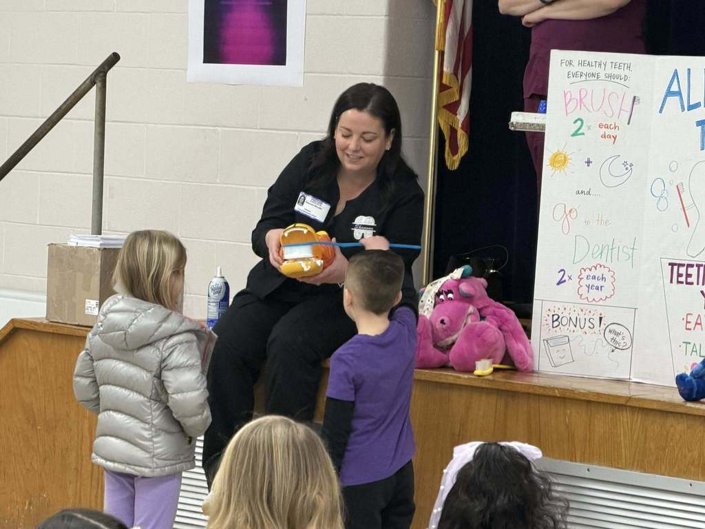 Nurse Teaching Brushing