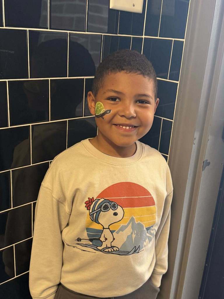 Smiling Boy with Facepaint