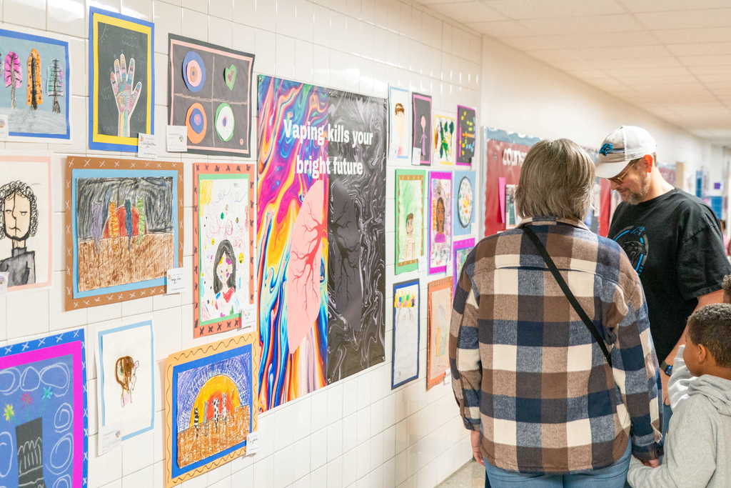 Family walking through Art Gallery