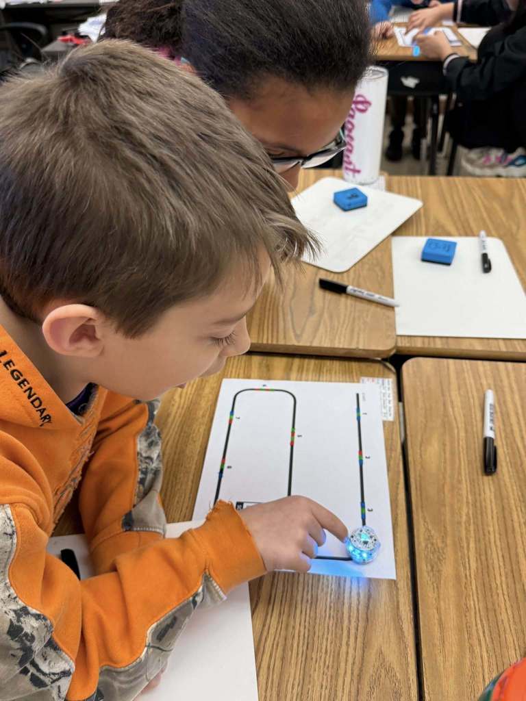 Students working with robots