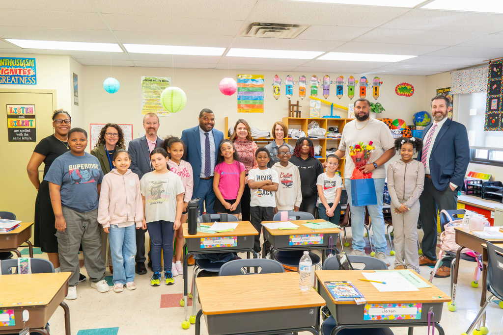John Bonner, North Elementary winner with students and district leaders