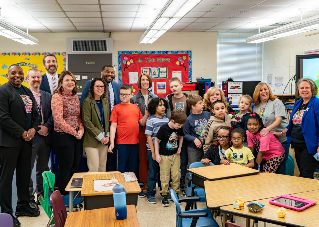 Jennifer English, Tussing Winner with district leaders and students