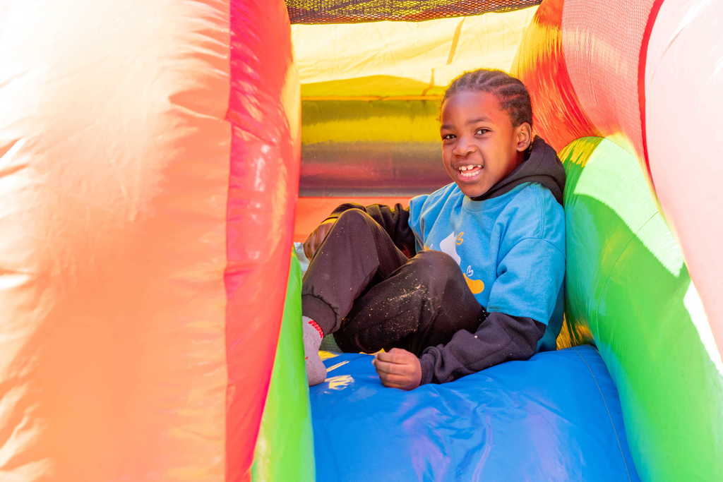 Student in bounce house