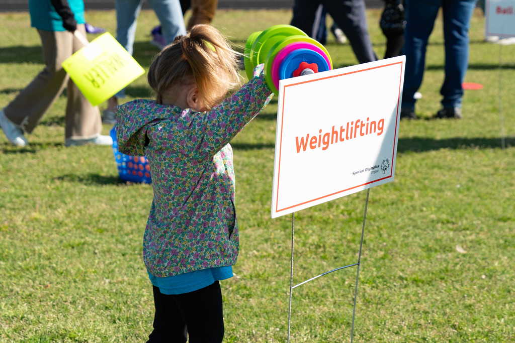 Student at weightlifting station