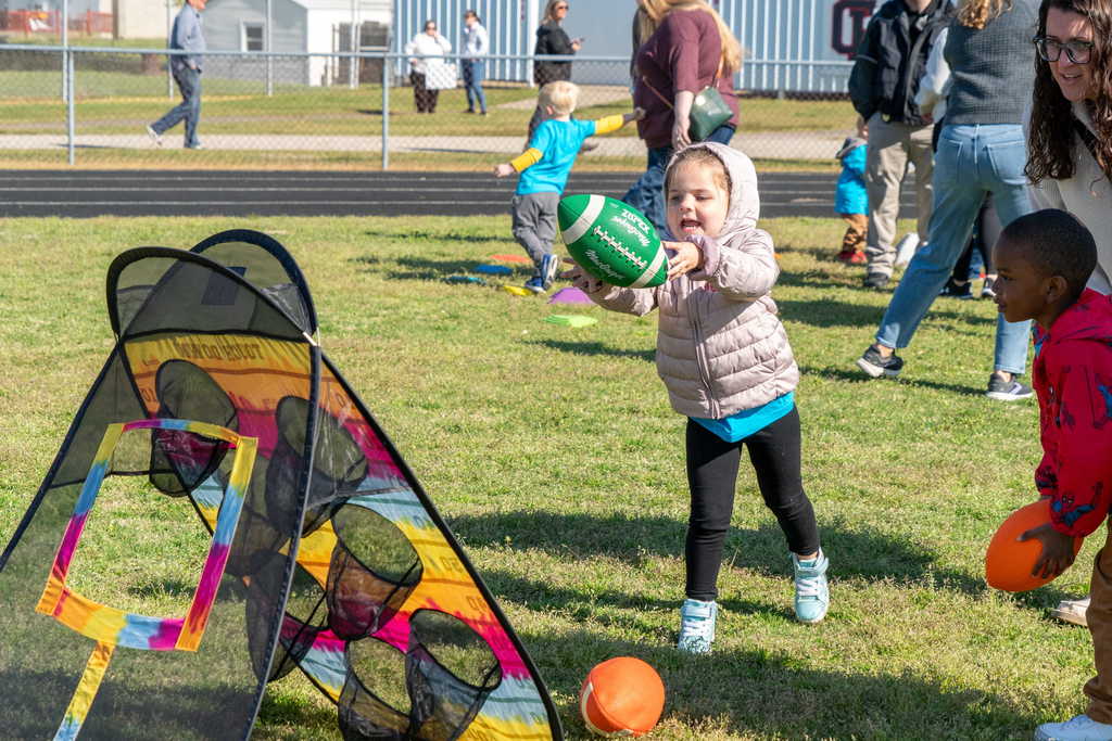 Students playing football game