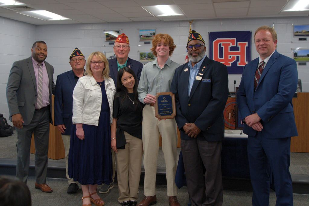 Deca students Presenting American Legion with plaque