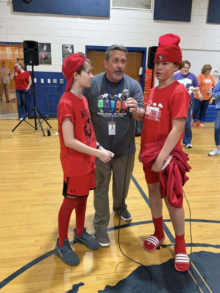 Teacher with students on House Pep Rally Day