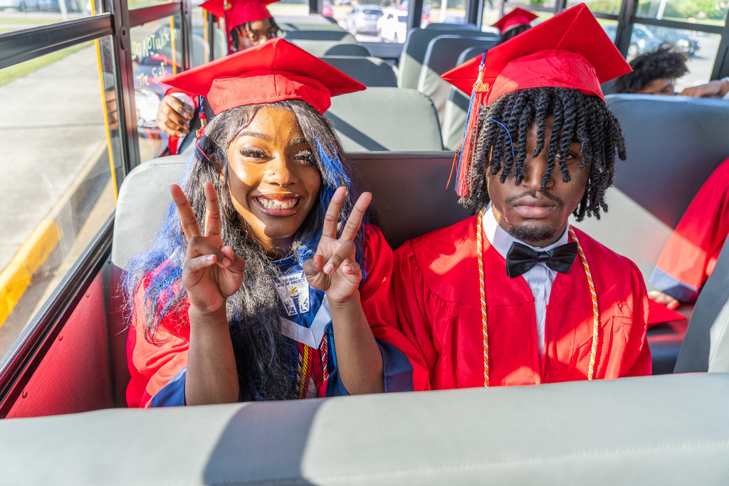 High School Seniors on bus to elementary schools