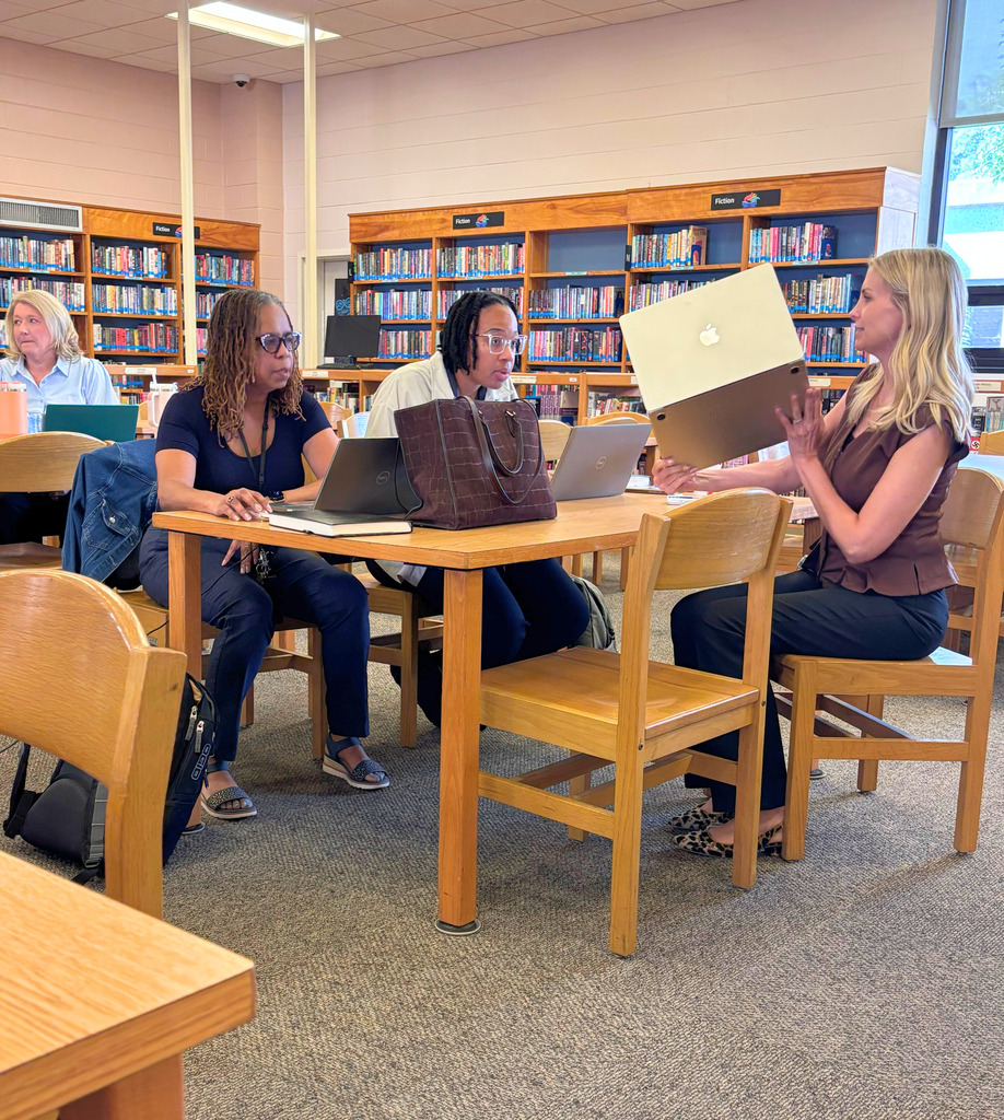 Leaders Collaborating at Tables