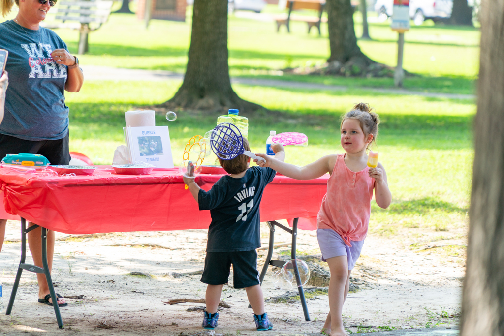 Kids Playing with Bubbles and Eating Ice Cream