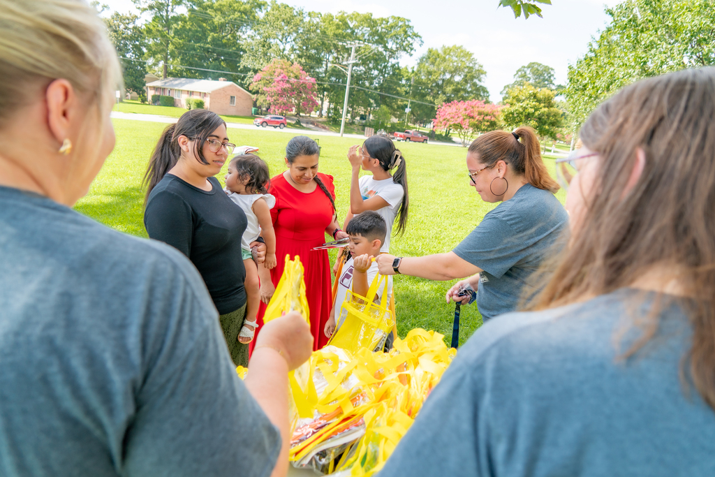 Handing out free supplies to families