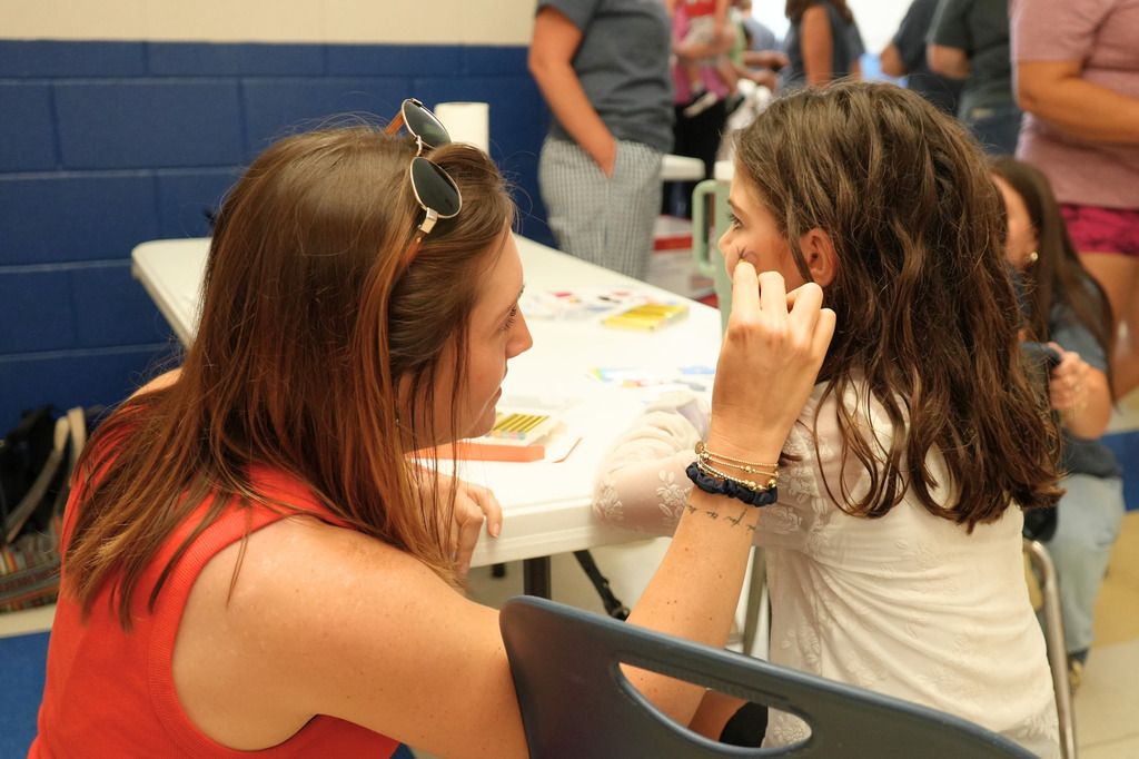 Teacher Facepainting Student