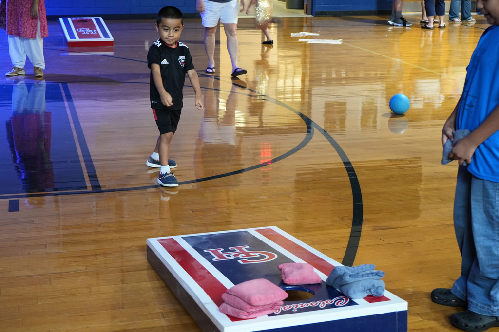 Boy Playing Cornhole
