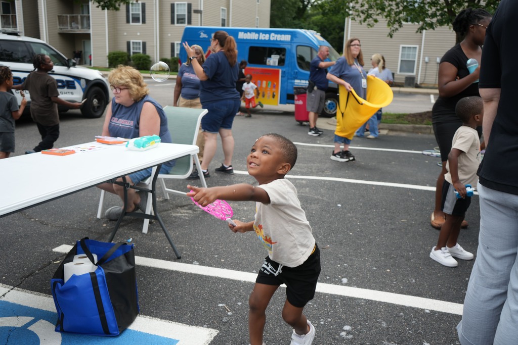Boy Chasing Bubbles