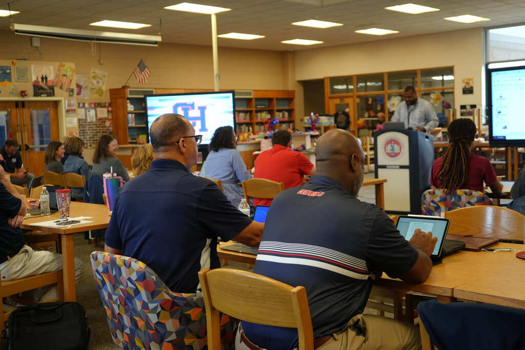 Leaders Sitting, Learning from Superintendent
