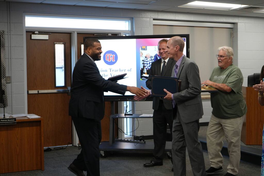 Division Teacher of the Year recognized with award form Superintendent