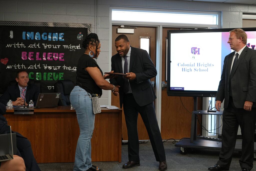 Colonial Heights High Support Staff of the Year, receiving award from Superintendent