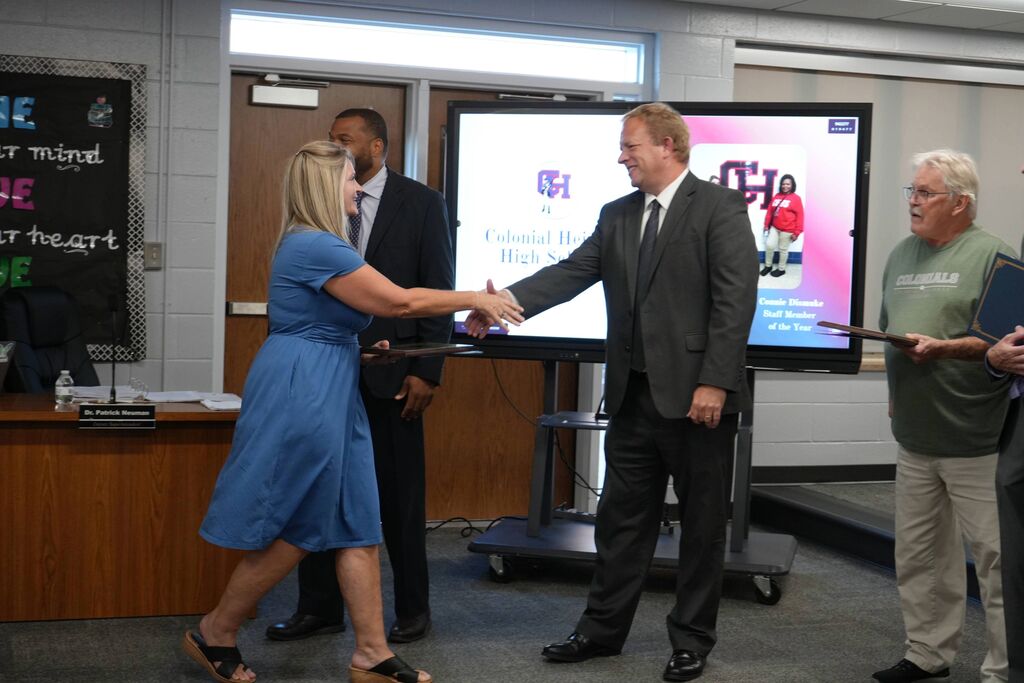 Colonial Heights High Teacher of the Year, receiving award from Superintendent