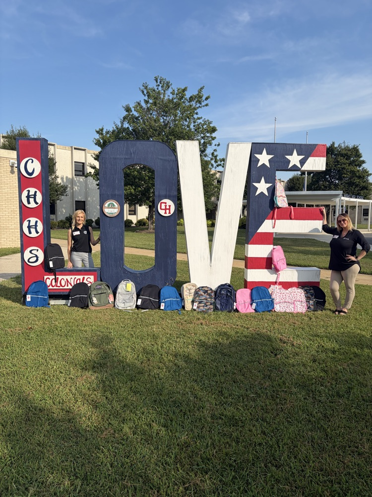 picture or workers from C&F bank with backpacks they collected 
