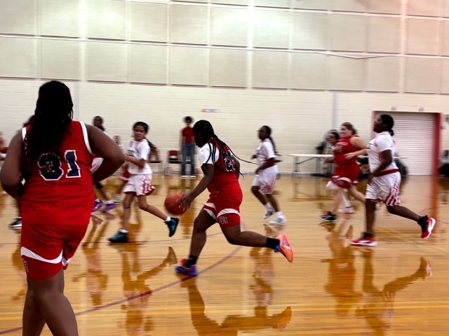 Driving hard down the floor.