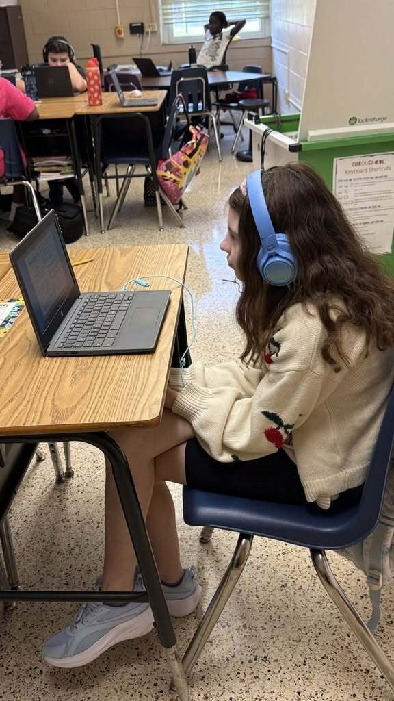 Students working on Chromebook