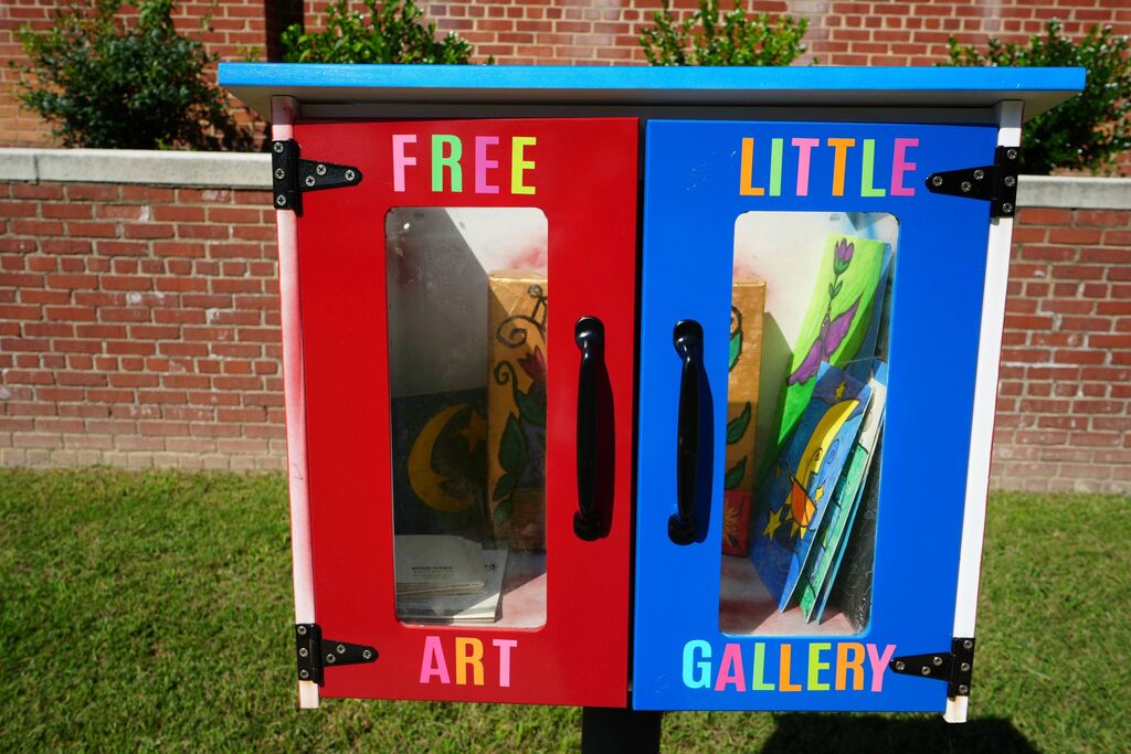 Front view of little free art gallery