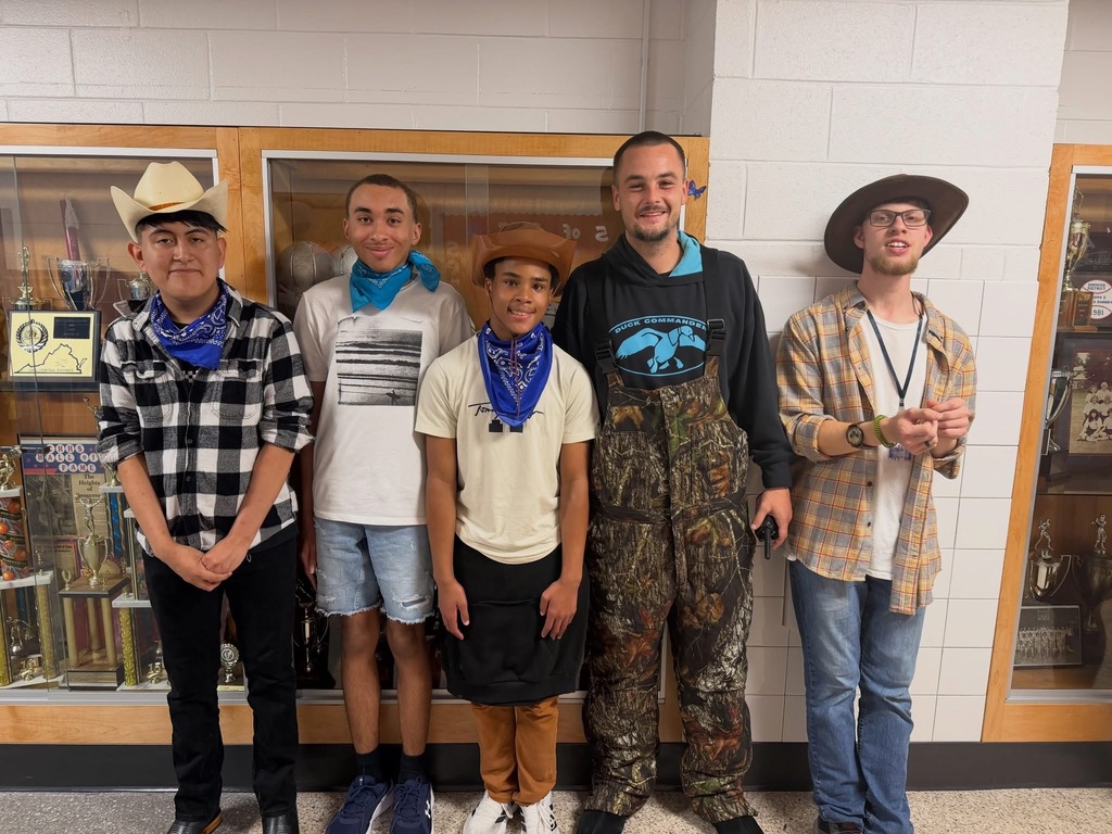 Students and Teacher Dressed up for Country Spirit day with cowboy hats and bandanas