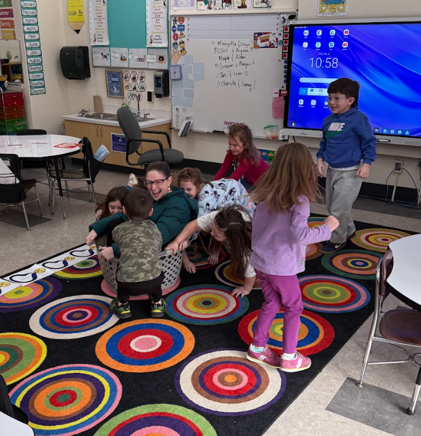 Miss Grant and our kindergarten Olympic math champions