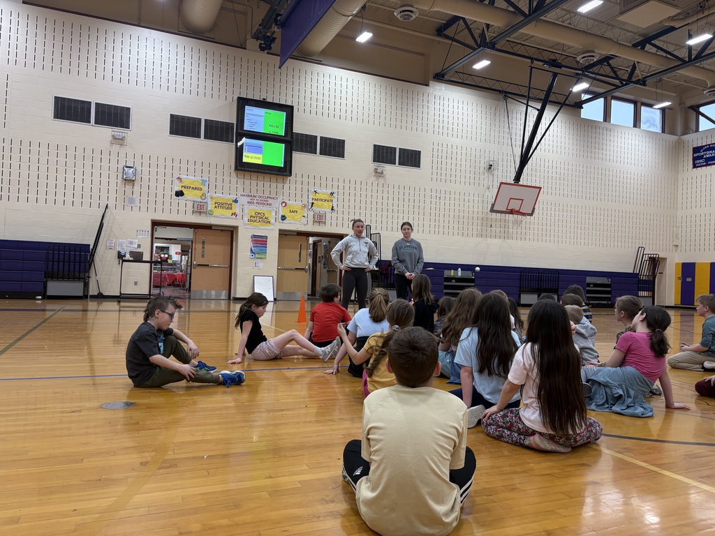 Clarkson hockey players & elementary students