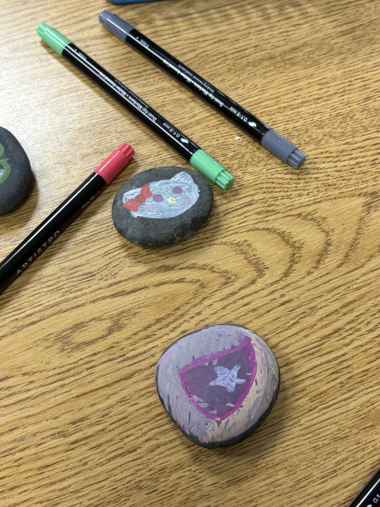 Rocks painted laying on a table