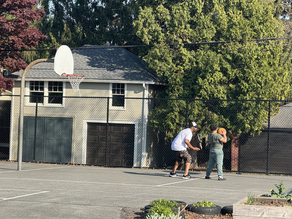 people playing basket ball during earth day celebration