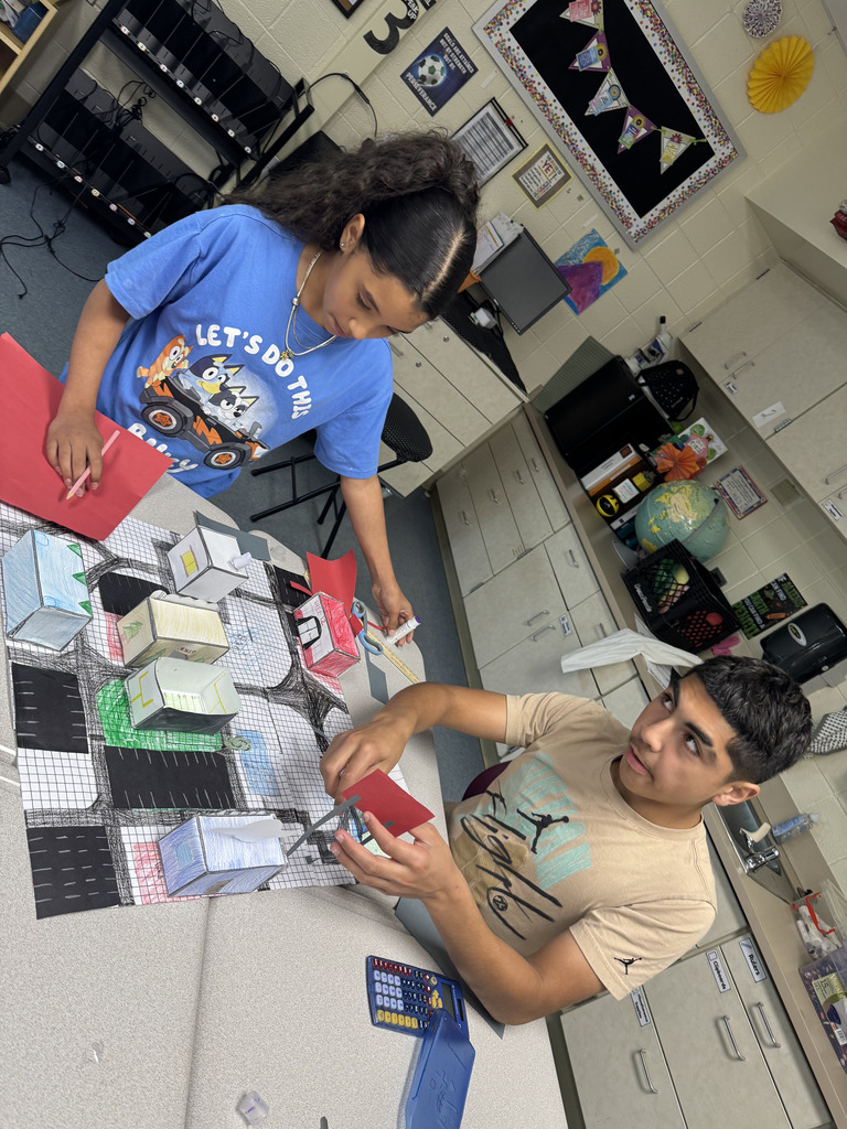 students working on geocity