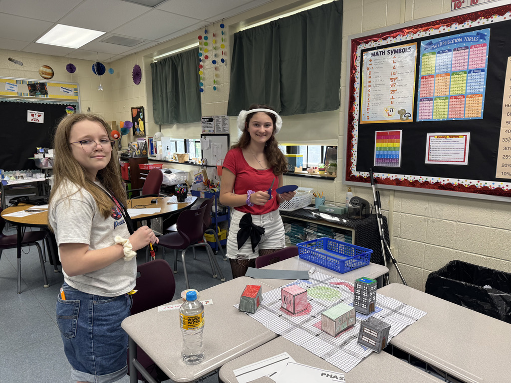 students working on geocity