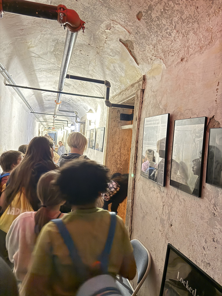 people walking in a hall