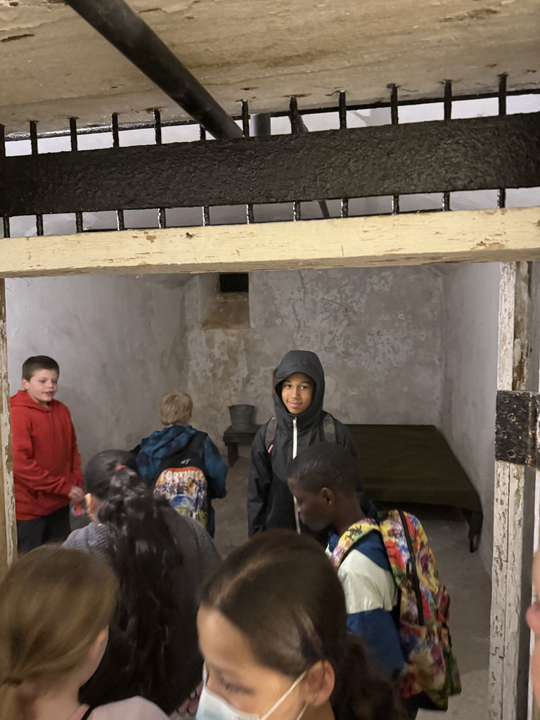 students standing the dungeon of columbia market house