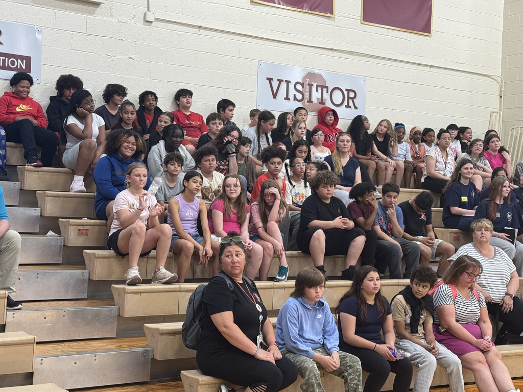 Students sitting on bleachers