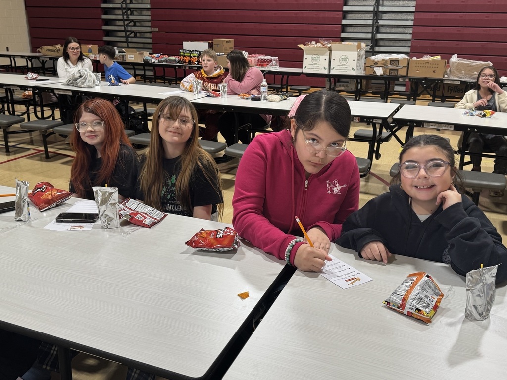 group of students sitting at a table