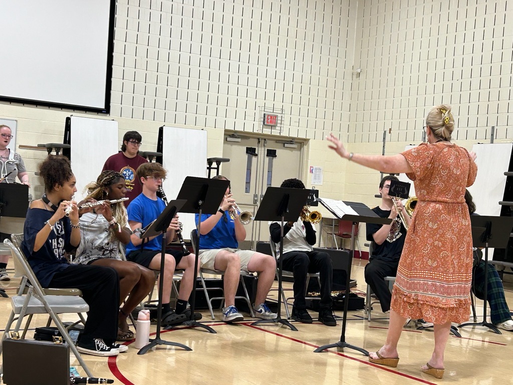 band members playing in a school gym