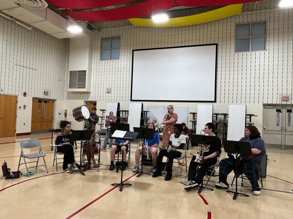 band members playing in a school gym