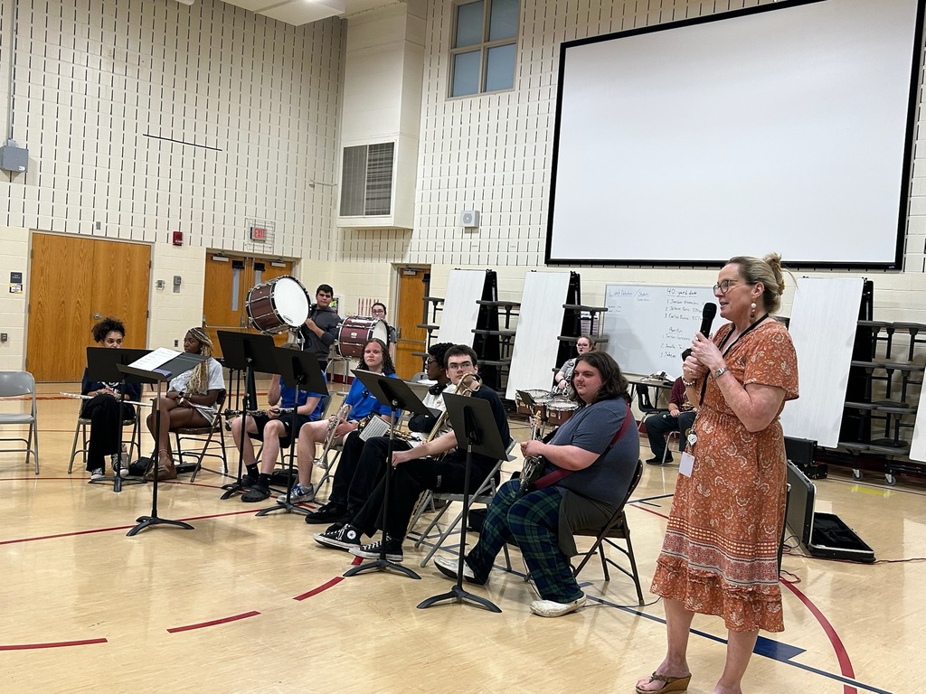 band members playing in a school gym