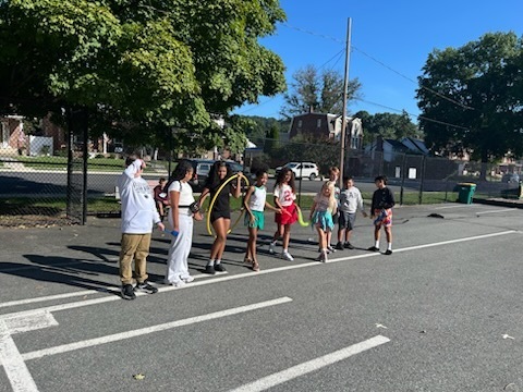 kids outside standing in a line