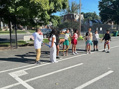 kids outside standing in a line