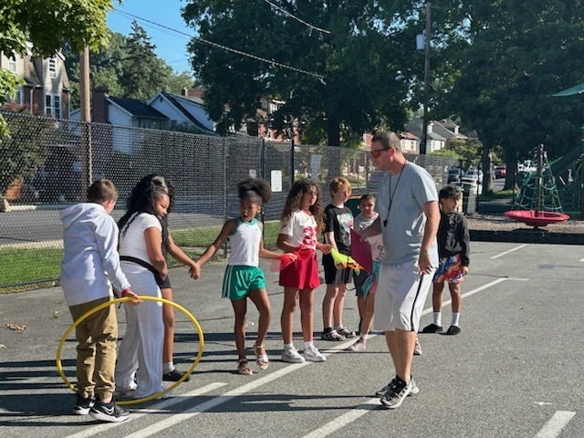 kids outside standing in a line