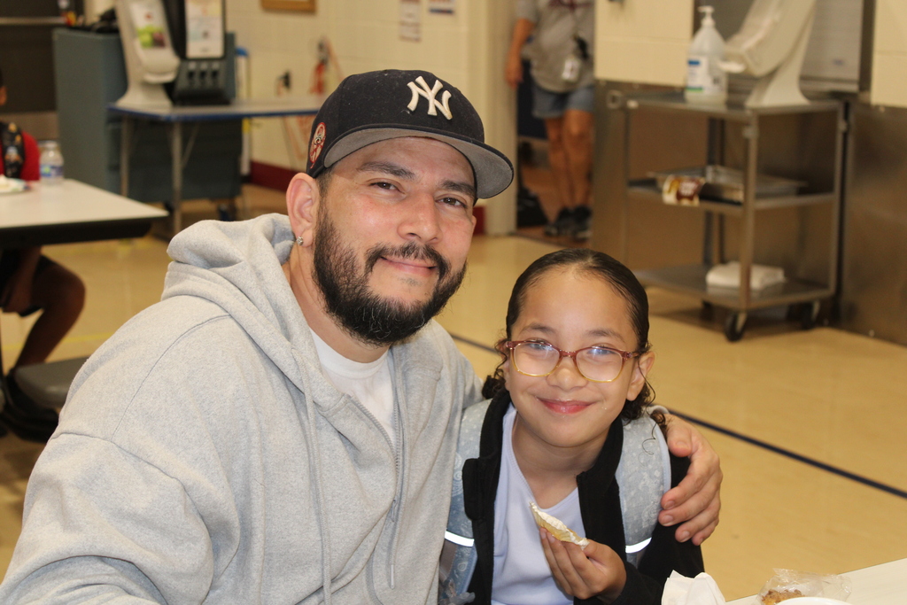 parent and student smiling together