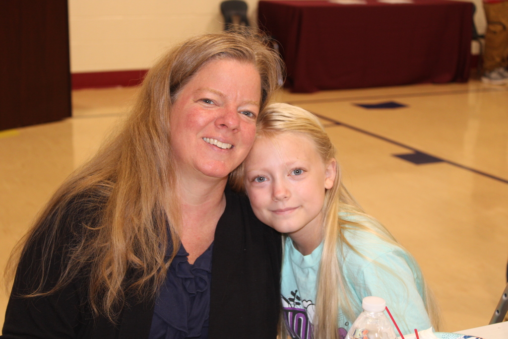 student and parent smiling for the camera