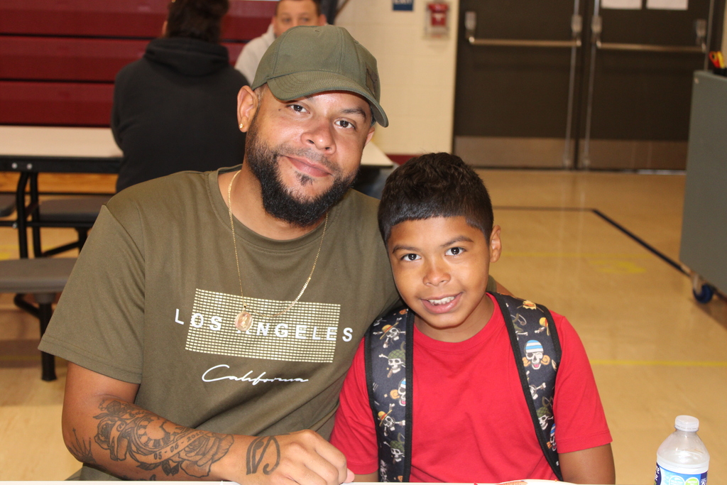 student and parent smiling 