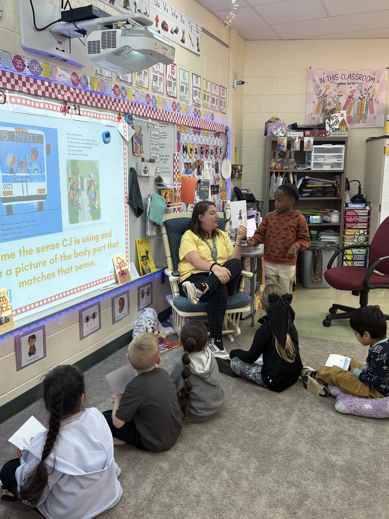 Kindergarten students in Mrs. Groff's class enjoyed reading the book "Last Stop on Market Street" by Matt de la Peña and making connections to the world around them through their five senses. As they followed CJ’s journey through the city, students identified things the characters could see, hear, smell, taste, and touch. They drew a picture of CJ using one of his five senses and then shared with the class. This engaging activity helped build reading comprehension while encouraging students to make meaningful connections between literature and their everyday lives.