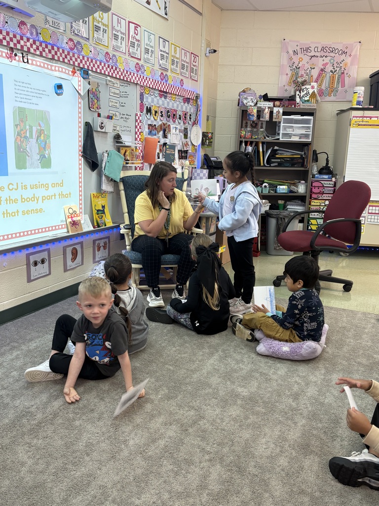 Kindergarten students in Mrs. Groff's class enjoyed reading the book "Last Stop on Market Street" by Matt de la Peña and making connections to the world around them through their five senses. As they followed CJ’s journey through the city, students identified things the characters could see, hear, smell, taste, and touch. They drew a picture of CJ using one of his five senses and then shared with the class. This engaging activity helped build reading comprehension while encouraging students to make meaningful connections between literature and their everyday lives.