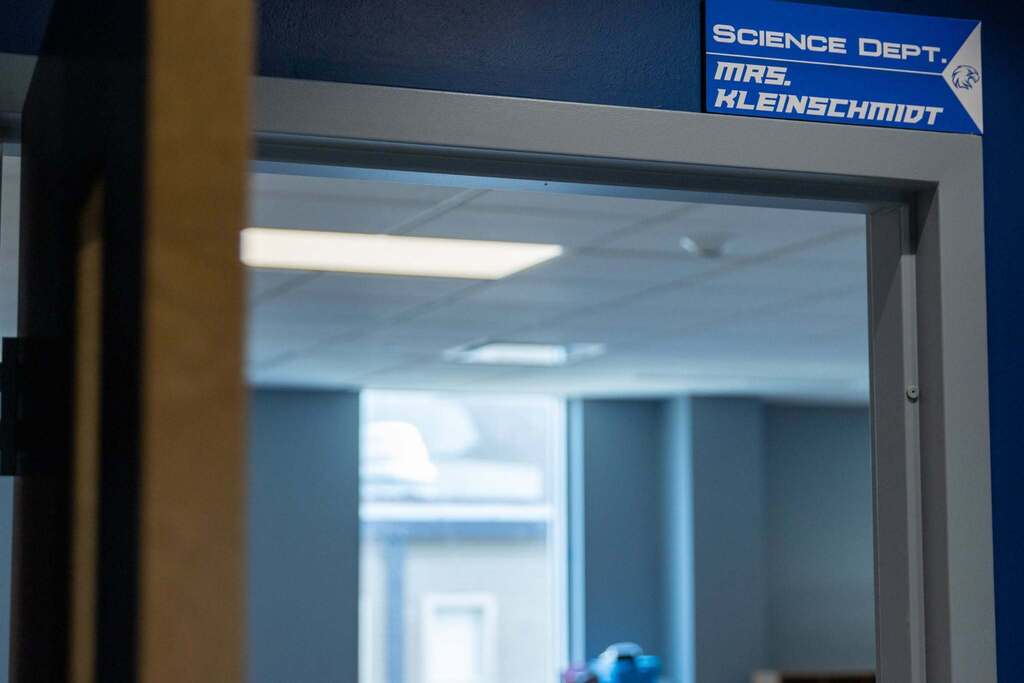 Science Department Mrs. Kleinschmidt sign at the top corner of the door 